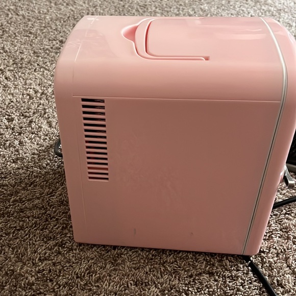 a skincare/ mini fridge, i do need to clean it a little, but it’s so cute! - Picture 2 of 4